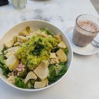 multi-green salad and cocoa with oatmilk at Bagel Cafe - Rehavia in Jerusalem