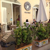 Outside seating area at Alfred's Bakery Cafe in Naxxar