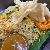 Love the dum briyani! The mock meat is hidden in the pile of rice and does not taste mockish. The rice is moist and not dry. Crackers need to eat fast else it will become soft.  at Gokul Vegetarian Restaurant - Fortune Centre in Central Singapore