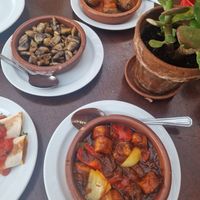 Mushrooms and the curry sausage dish at El Saloon in Gran Canaria