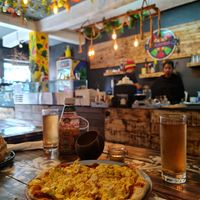 Goddess pizza with tofu, vegan cheese and supposedly fresh vegetables. at Shlomo in Grand Baie