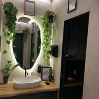 Bathroom decor at Fit Food in Tirana