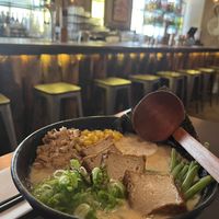 The bar in the background   at Kinton Ramen - McGill in Montreal