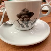 Coffee here has his own cup !  at El Huerto in Santiago