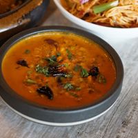 yellow daal tadka.
Gluten Free/Vegan.
yellow lentils. onion. tomato. cilantro. chili. indian spices. at Inchin's Bamboo Garden in Bellevue