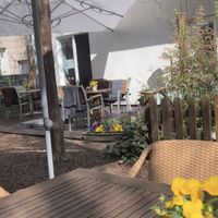 Cafe garden in the courtyard  at Snoopkraam in Hamburg