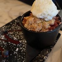 Apple and blackberry crumble with vegan ice cream 😋  at Prince William in Brixham