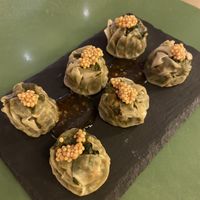 Vegan dim sum with mustard on top  at Wolf Sharing Food Market in Brussels
