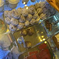Vegan chocolate coconut balls, hazelnut praline, raw raspberry bar & chocolate almond bar  at Qoffee in Malmo