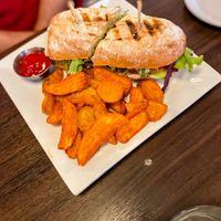 NOPALES TORTA: Fried cactus with avocado, spring mix, tomato, and onion; served with aioli on telera bread. at Mox Boarding House in Bellevue