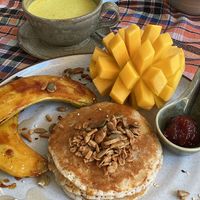 Vegan Pancakes and golden milk with almond milk. Delish   at JaJa Cafe & Spice in Koh Phi Phi