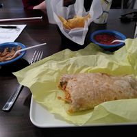 Veggie burrito and nachos at La Fonda Of Inglewood Restaurant & Cafe in Inglewood