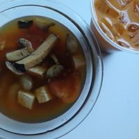 seafood tom yum and thai iced tea at Urban Vegan - Lake View in Chicago