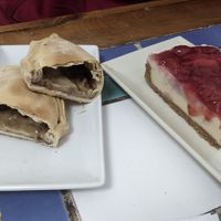 Empanada queso y championes, y cheesecake at Violeta Dulceria Vegana in Valparaiso