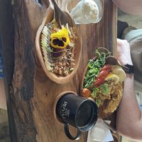 Soy yogurt and granola bowl and tempeh hummus plate   at The Royal Food & Drink in Seoul