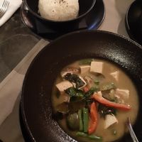 Green curry with mini eggplants. Comes with rice and it's delicious. This is my first time trying this kind of taste combination and that is pretty impressive. at ARROI Restaurant in Bled