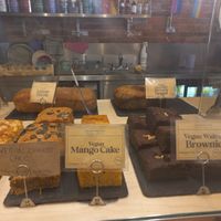 Vegan cakes on counter at Laughing Dog in Worthing