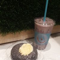 Purple Topper (v) - Purple Glazed Ube donut w/ [vegan] buttercream & Purple Reign iced chai tea at Everglazed Donuts & Cold Brew in Lake Buena Vista