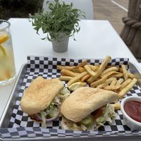 Vegan oyster mushroom po boy, fries and mango lemonade!  I was hungry and took a bite before the photo;)  at the hive vegan eatery in Houston
