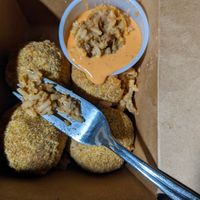 Boudain balls to go at the hive vegan eatery in Houston