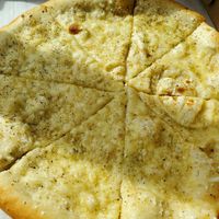 Garlic, oil and violife at Anika's Pizza in Moultonborough