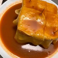The famous francesinha!! at Lupin Snack Bar in Porto