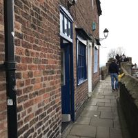 Look for the blue door    at Fika+ in Chester