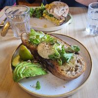 Vegan poached egg and avocado with homemade bread at Fika+ in Chester