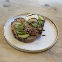 Avo on toast with “runny” vegan egg 😋  at Fika+ in Chester