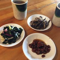 Complimentary side dishes and hot tea! Eggplant, beans, and seaweed side dishes this time. These revolving side dishes (ban chan) are so fun!  at Gangnam Style Korean Kitchen in Syracuse