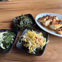 perilla leaf, seaweed cucumber salad, bean sprouts as basic complimentary side dishes plus tofu as special treat for us the regulars at Gangnam Style Korean Kitchen in Syracuse