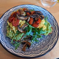 Loaded avocado toast with tofu scramble, mushrooms, tomatoes, for brunch at The Magic Sunflower in Dronfield