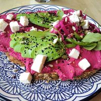 Beetroot hummus and avocado on sourdough toast 💜💚 at The Magic Sunflower in Dronfield
