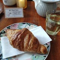 Croissant with Sencha at Café Rotkehlchen - Merowingerstraße in Cologne