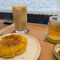 Oat milk latte and pumpkin soft bread at Salute - 살루떼 in Chuncheon