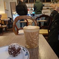 A cinnamon latte and a chokladbullar at Cafe Krans in Stockholm