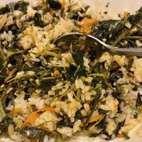 My style bibimbap. Put rice & all mountain leaves in the bowl, add little bit of soy sauce, little bit of gochujang, 2 spoons of denjangjjigae, 1 spoon of sesame or perilla oil.  at Eden in Seoul