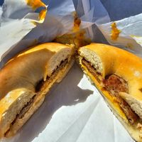 Sausage, egg, and cheese on a plain bagel at Ben & Esther's Vegan Jewish Deli in San Diego