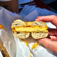 Egg and cheese on a cinnamon raisin bagel at Ben & Esther's Vegan Jewish Deli in San Diego