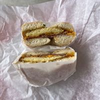 Egg, cheese, bacon, onion bagel at Ben & Esther's Vegan Jewish Deli in San Diego