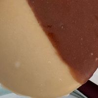 Closeup of black and white cookie at Ben & Esther's Vegan Jewish Deli in San Diego