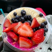 Custom smoothie bowl with pitaya and coconut bases  at Playa Bowls in Warrington