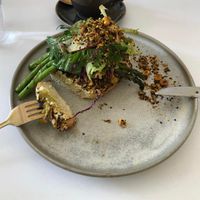 Grilled asparagus on toasted sourdough with sunflower seed hummus, braised fennel, hazelnut dukkah, shaved fennel salad, hazelnut and capper dressing at Calibrate Coffee in Roseville