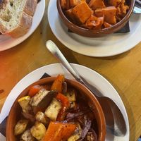 Roasted sweet potato and red pepper, roasted Mediterranean vegetables, garlic sourdough bread  at Cubana Tapas Bar in Sheffield