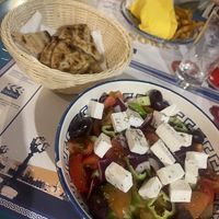 Greek salad with vegan feta and a side of pita  at Gyrosteria Yannis - Borgo Antico  in Bari