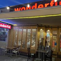 Restaurant sign and front   at wonderful in Millbrae