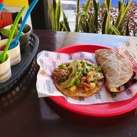 Taco rarito (left) and the C. Flor de Jamaica(right), which is a quesadilla at Coapenitos in Cancun