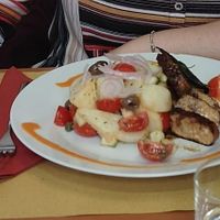 Home made seiten with potato salad at Hosteria della Pignatta in Binasco