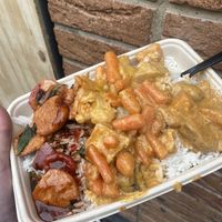 Mix of yellow Thai curries and rice and ‘chicken’ curry   at Vegan Thai Food - Food Stall in North West London