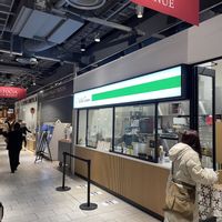 Food stand with a few seats.   at With Green - Yurakucho in Tokyo